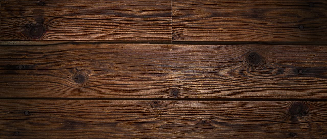 High-resolution image of a rustic wooden texture, ideal as a background for design projects.